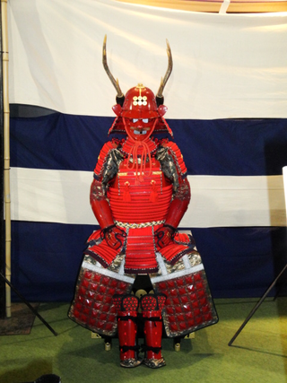 Illustration for article titled Booth Check: The Warlord Armor of TGS